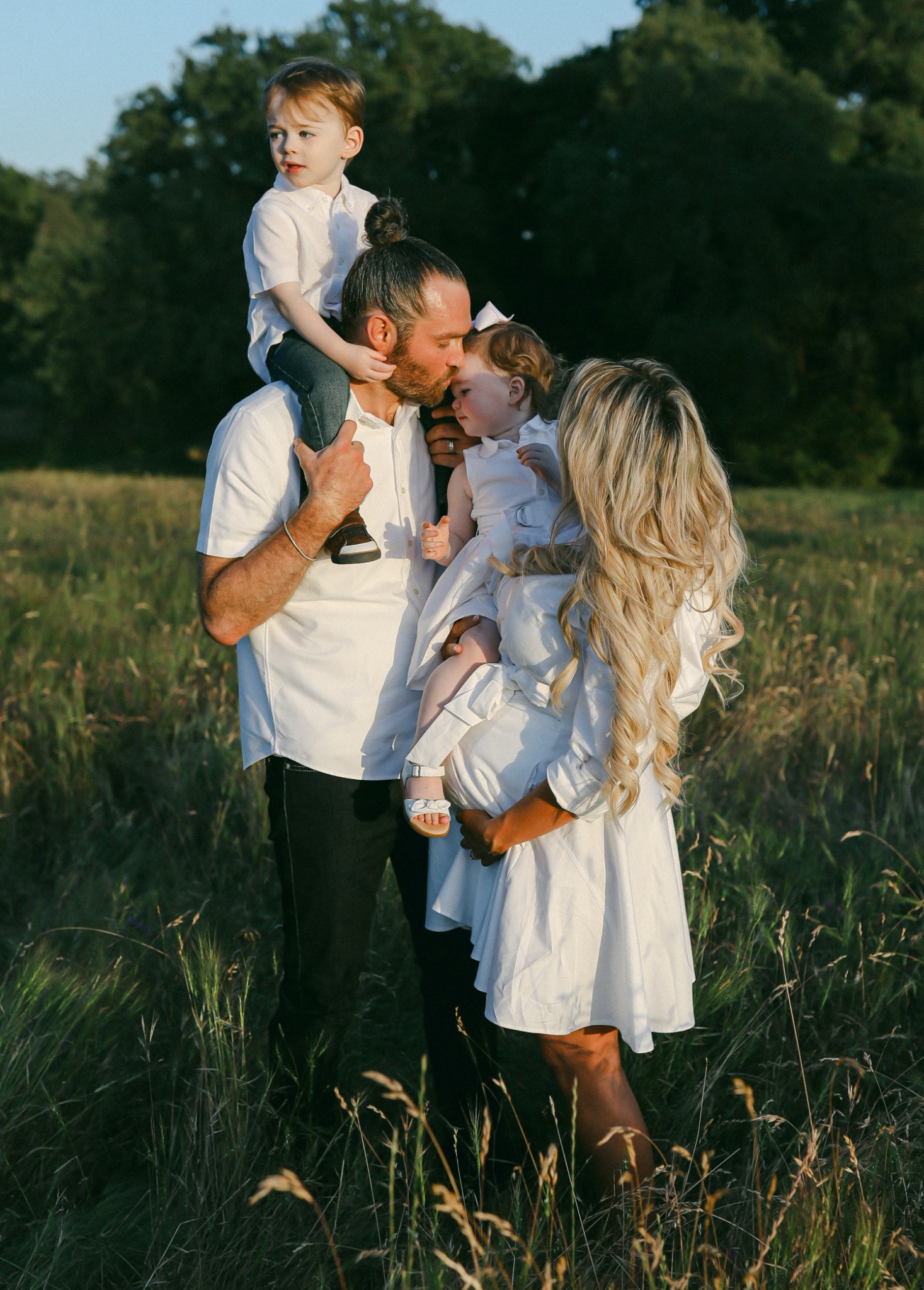 Ash and Ashley with their children